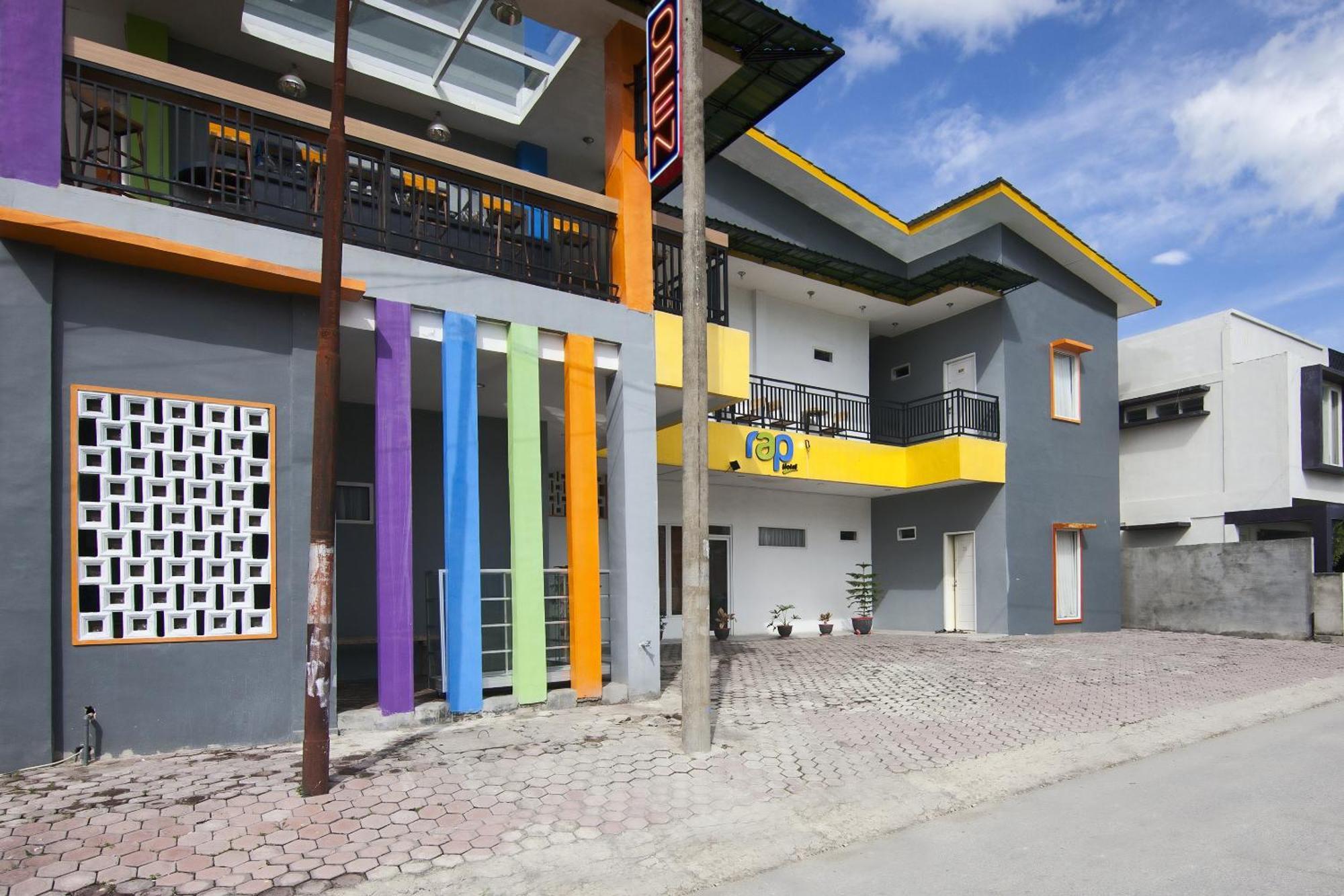 Rap Hotel Balige Bagian luar foto